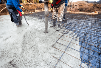 Concrete crew pouring a foundation slab for a residential home in Sandy, UT
